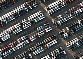 aerial view of cars parked on a parking lot