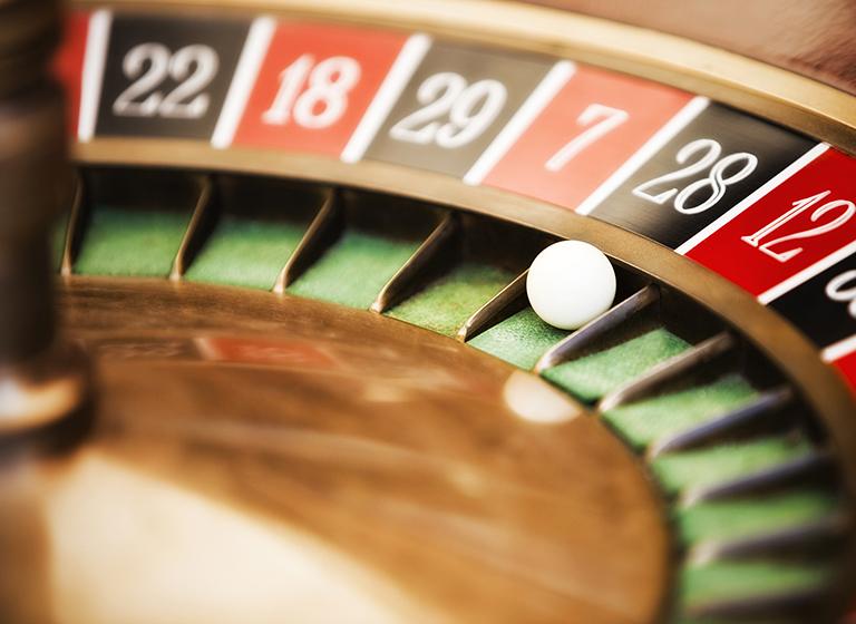 Roulette wheel in casino, close-up on No. 28