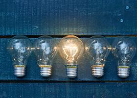 Lightbulb lit up to represent creative idea