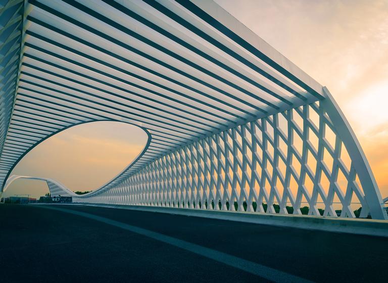 Modern bridge at sunset